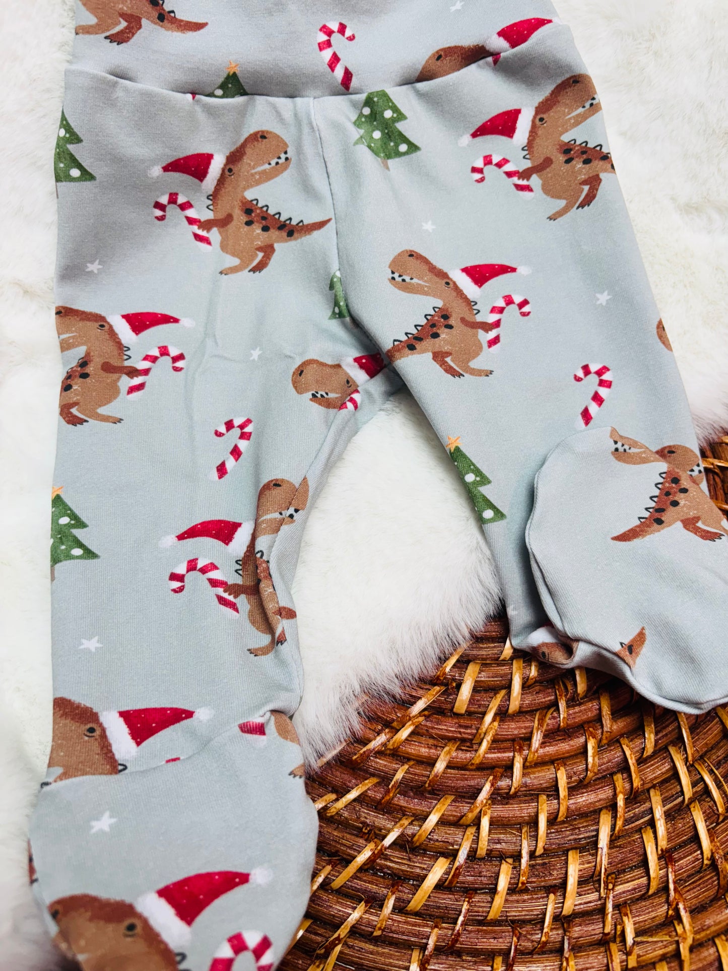 Pantalon à pieds dino de Noël