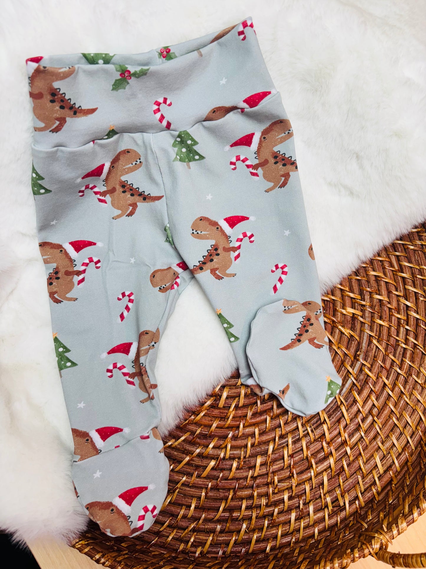 Pantalon à pieds dino de Noël